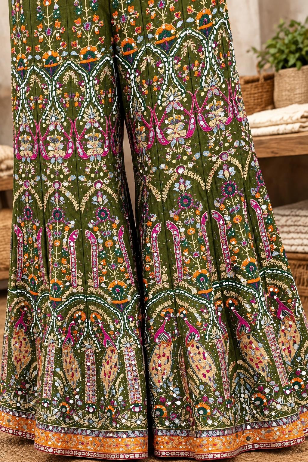 Mehndi green palazzo with multicolour thread embroidery, arches and peacock motifs