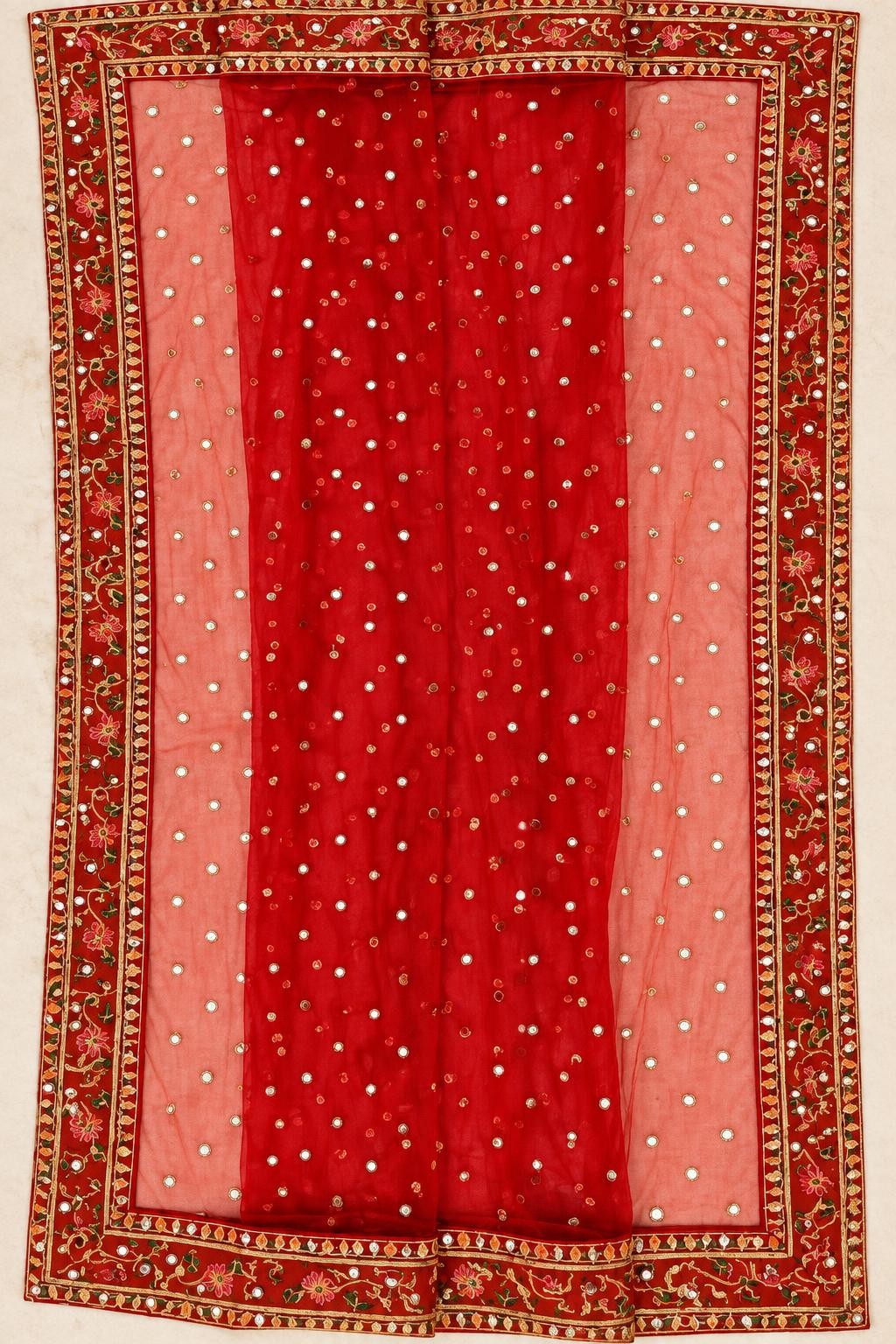 Red net dupatta with mirror-dot work and a red and gold embroidered border