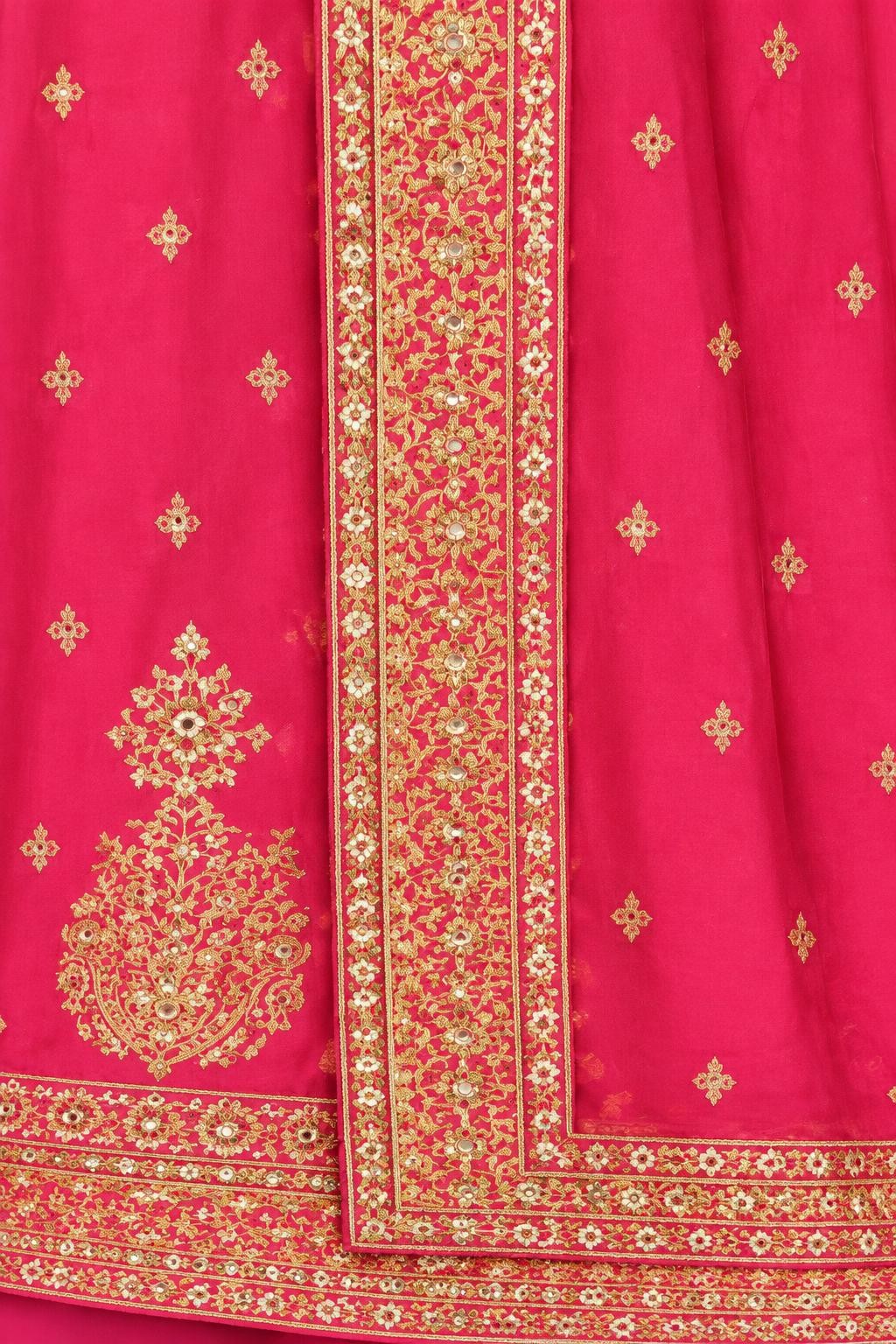 Close-up of the pink dupatta's gold embroidered border